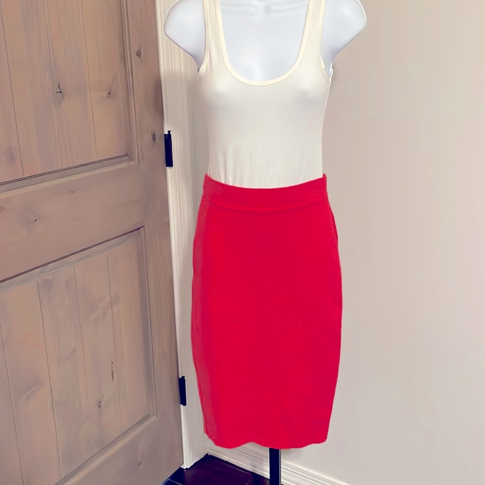 3 pencil skirts size small. Soft stretchy material. Navy, hot pink & light blue